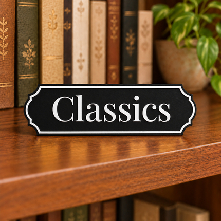 Classics approved fixed lettering, shown on a freestanding genre sign as a lettering and color example.