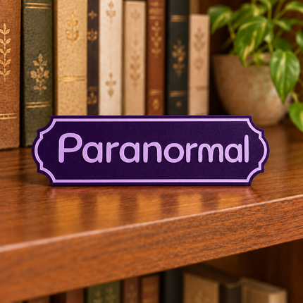Paranormal approved fixed lettering, shown on a freestanding genre sign as a lettering and color example.