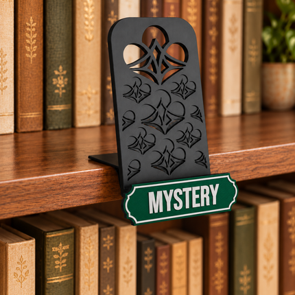 Mystery genre sign attached below the black book display shelf at the bookshelf edge. Example colors shown.