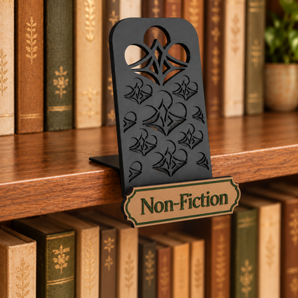 Non-Fiction genre sign attached below the black book display shelf at the bookshelf edge. Example colors shown.
