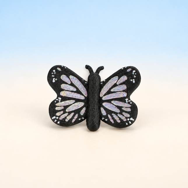 Micro Butterfly miniature in Black and White, individual variant photo.