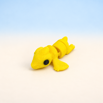Micro Dinosaurs miniature in Yellow, individual variant photo.