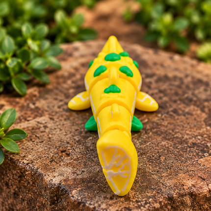 Top rear view of the Micro Lemon Shark showing green accents and its lemon-patterned yellow tail.