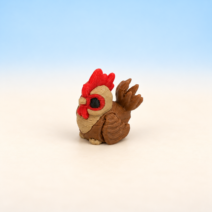 Micro Rooster miniature in Brown, individual variant photo.