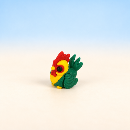 Micro Rooster miniature in Green and Yellow, individual variant photo.
